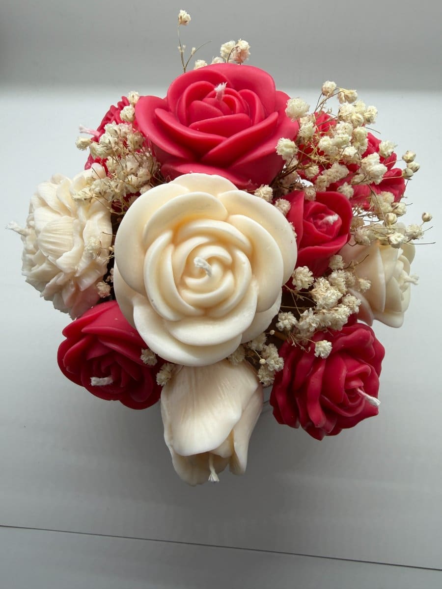 Blush and cream wax blooms with dried gypsophila