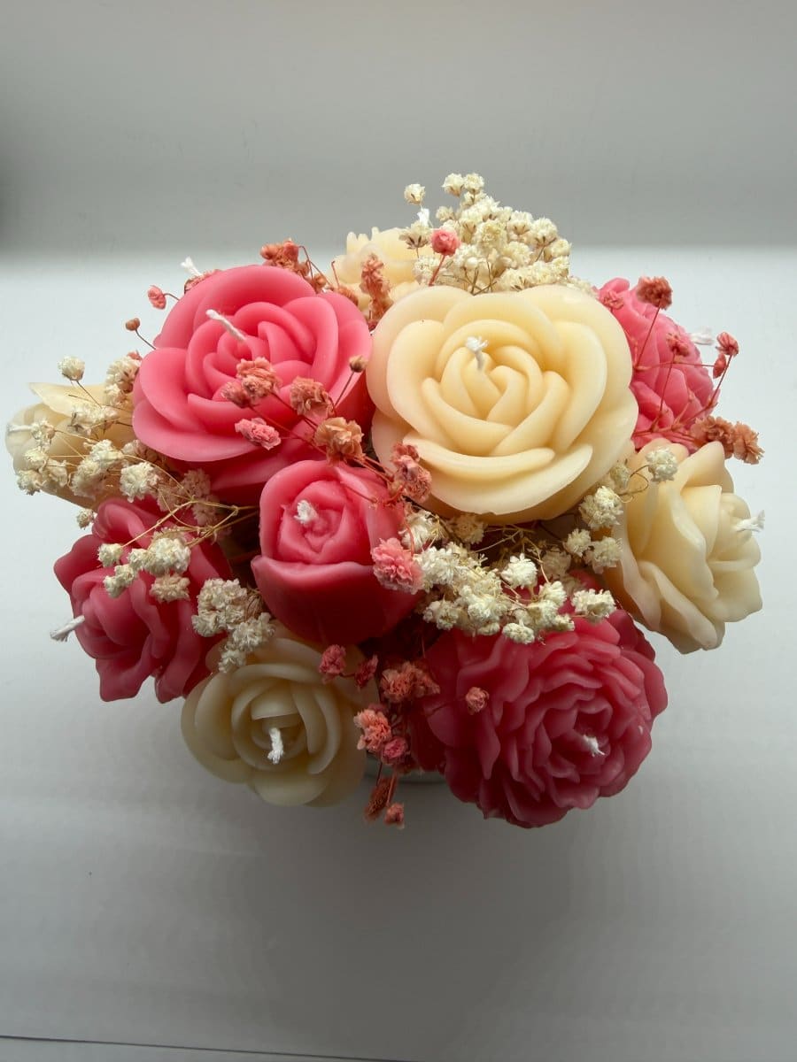 Overhead view of red and ivory wax roses